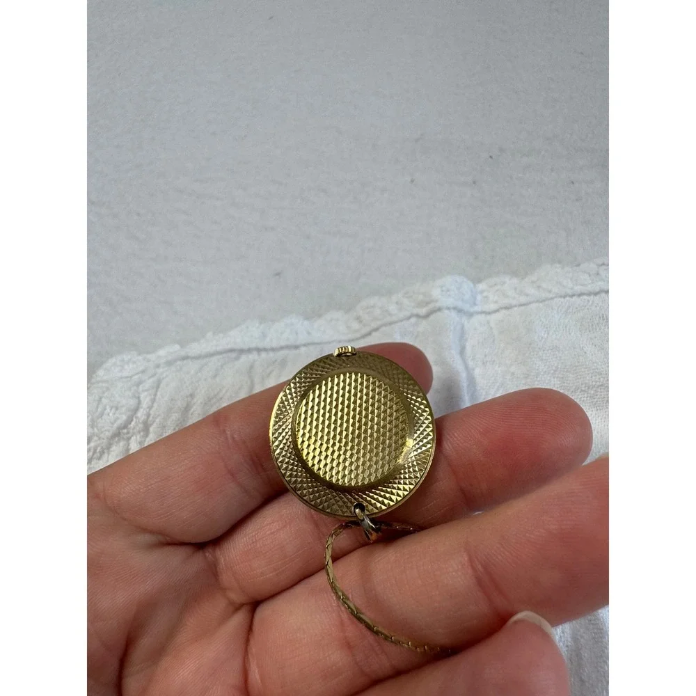 Vintage Bulova Womens OS Pendant Watch Necklace Gold Textured Bezel Swiss Made